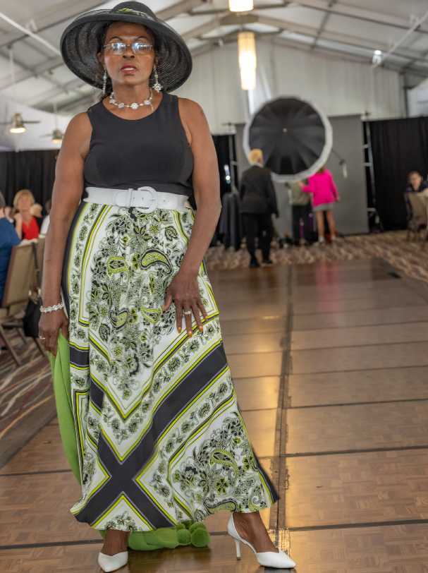 Clara Washington struts her stuff on the runway at Timeless Elegance 2025. 